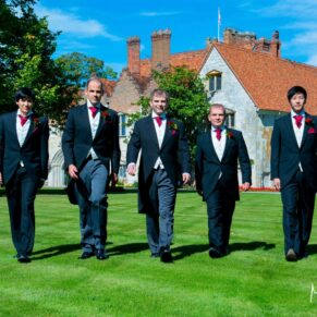 The lads pre ceremony walking towards the camera 'Reservoir Dogs' style