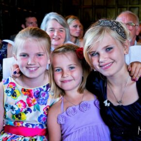 Three shy young children captured during the indoor civil ceremony
