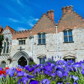 With all its flower borders Bisham Abbey is so colourful for a wedding day