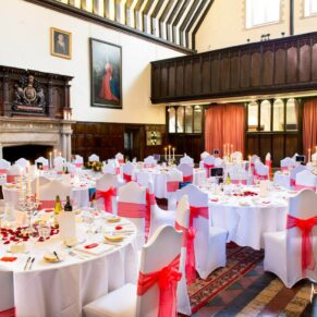 The grand Banqueting Hall interiors all setup for the wedding breakfast at Bisham Abbey