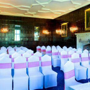 The gorgeous oak panelled civil wedding ceremony room setup at Bisham Abbey