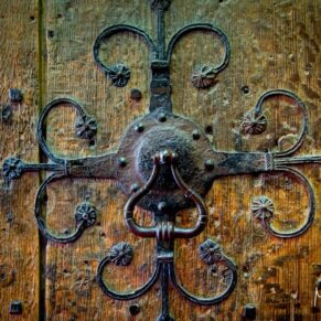 A carved oak doorway detail at the abbey