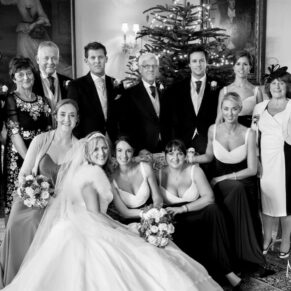 Black and white Buckinghamshire group pose wedding photography captured at Hampden House