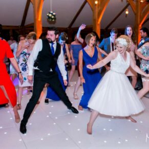 Dancing the night away was always on the cards for this fun loving bride at her Brocket Hall wedding