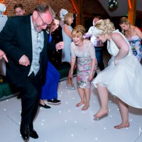 Time to dance until you drop for this fun photography moment between the bride and her father at her Brocket Hall wedding in Hertfordshire