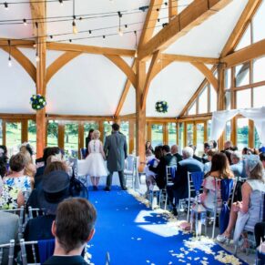 The civil ceremony in progress in the barn on this fabulous Hertfordshire estate