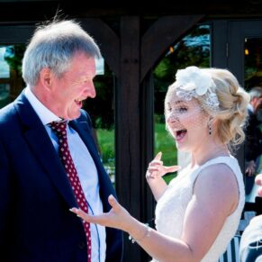 Reportage capture of the bride and a family friend