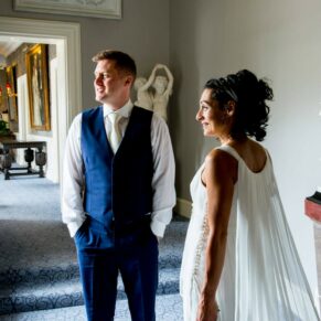 Cliveden House wedding photography captured in the grand curved corridor