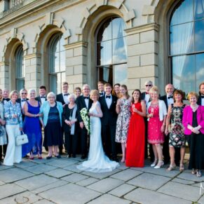 Cliveden House wedding photography - group pose on the parterre