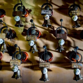 The servants bells dramatically lit - Cliveden House wedding photography