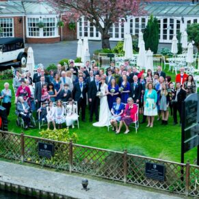 Photography of all the wedding guests captured from the bridge at the wonderful Compleat Angler Hotel in Marlow