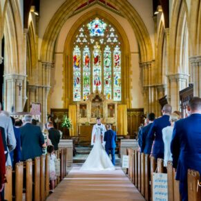 All Saints Church ceremony in progress - this fabulous church is just across the water from the Compleat Angler wedding reception venue in Marlowe