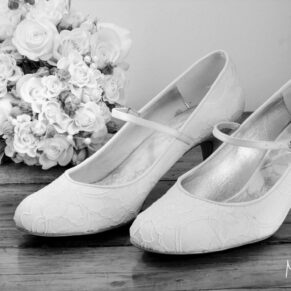 The bride's shoes and flowers captured before her civil ceremony