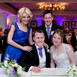 The newlyweds with their witnesses during the indoor civil ceremony