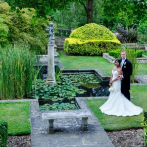 The newlyweds enjoying their time away from the crowds in the Italian Sunken Garden at Danesfield House