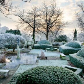 The sunken garden at Danesfield House always entices me no matter what the weather is doing - on this occasion I couldn't believe my luck when I discovered it covered in this magical glaze - as winter wonderlands go it doesn't get any better for an out of season wedding - there's just so much happening in this shot that the eye is totally drawn in The Italian Sunken garden on a crisp morning after a hard frost at this fabulous winter marriage