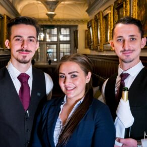 I even include the hotel's staff in the posed pictures sometimes