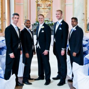 The lads in a formal pose in the Versailles Suite pre wedding ceremony