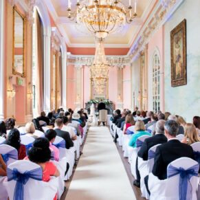The marriage ceremony in full swing in the grand Versailles Room at Danesfield House