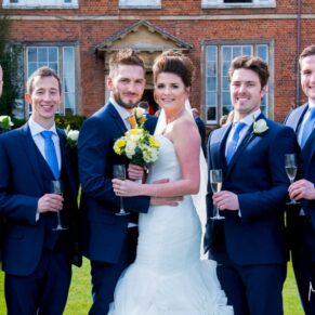 Dorton House wedding photography - a relaxed group poses wit the lads