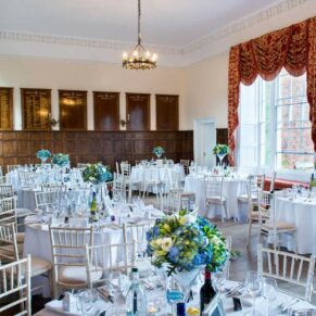 Setup for the wedding breakfast in the dining room at this Dorton House wedding reception