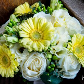 Dorton House wedding photography - the bride's flowers captured in the rustic window surround
