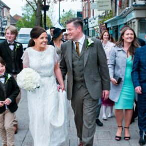 Berkhamsted Gatsby wedding photography of the newlyweds on route to their reception