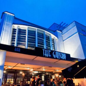 Berkhamsted Gatsby wedding photography - the stunning Art Deco exterior at dusk