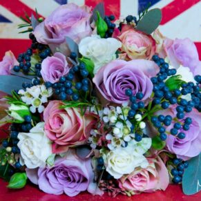 Strikingly colourful flowers against a Union Jack flag backdrop