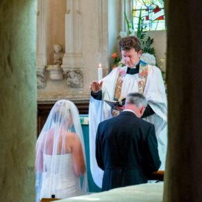 Capturing the blessing during the church ceremony at Hampden Church