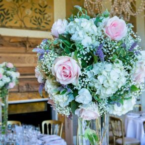 Gorgeous floral arrangements seen here in the dining room
