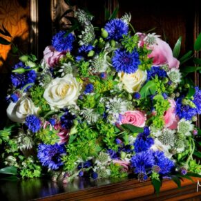 The bride's colourful and exquisite bouquet captured in the Great Hall