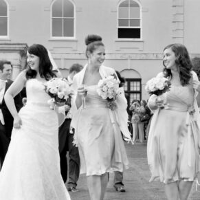 The ladies take a stroll across the lawns during the drinks reception