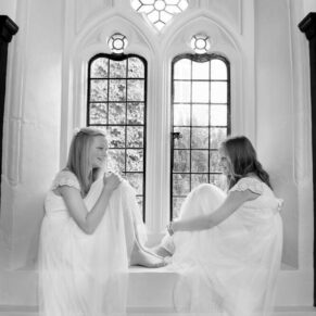 The flower girls enjoy a chat in this fabulous feature window at this historic venue