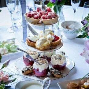 Sumptuous afternoon tea treats prepared for the guests on every table in the Dining Room