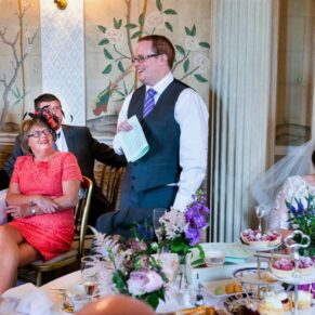 The groom's speech captured in full flow with an appreciative audience  listening in
