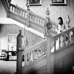 Hartwell House wedding photography of the bride on the staircase pre ceremony