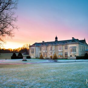 The exterior of Hartwell House captured at sunrise on a frosty Christmas morning