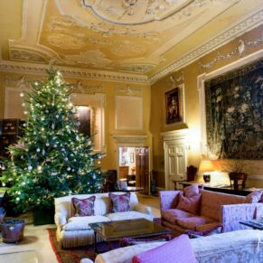 The Great Hall inside Hartwell House at Christmas