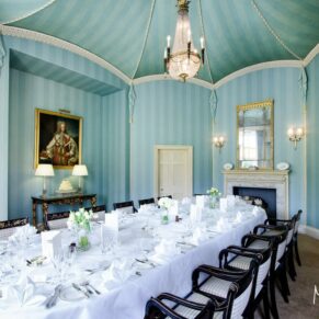 Inside Hartwell House's stunning Octagon Room which is all set for the wedding breakfast