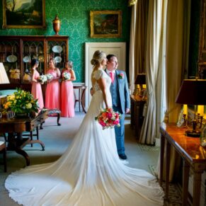 A regal pose beside a feature window of the newlyweds captured in the main house at their Hartwell House wedding