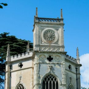 The stunning chapel in the grounds of Hartwell House under a perfect blue sky