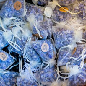 Kings Chapel Amersham wedding photography - blue confetti bags at the ready