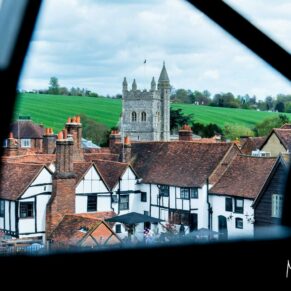Kings Chapel Amersham wedding photography - view of the high street through the leaded windows