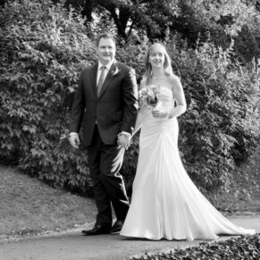The couple take a stroll through the gardens at their Le Manoir Aux Quat Saisons wedding