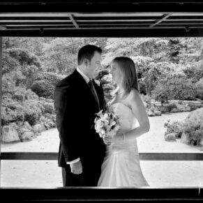 The newlyweds captured in the Japanese garden pavilion at Le Manoir Aux Quat Saisons