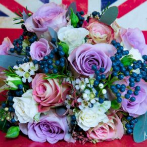Le Manoir Aux Quat Saisons wedding photography - the striking flowers with the union flag behind