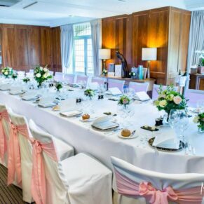 The gorgeous dining room setup for the wedding breakfast at Le Manoir Aux Quat Saisonst