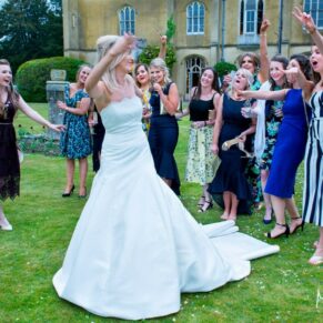 This bride certainly knew how to party with her girlfriends as they walk through the gardens dancing every step of the way