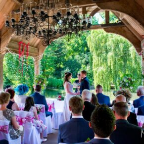 The outdoor pavilion civil ceremony in progress on a glorious summer's day at The Dairy